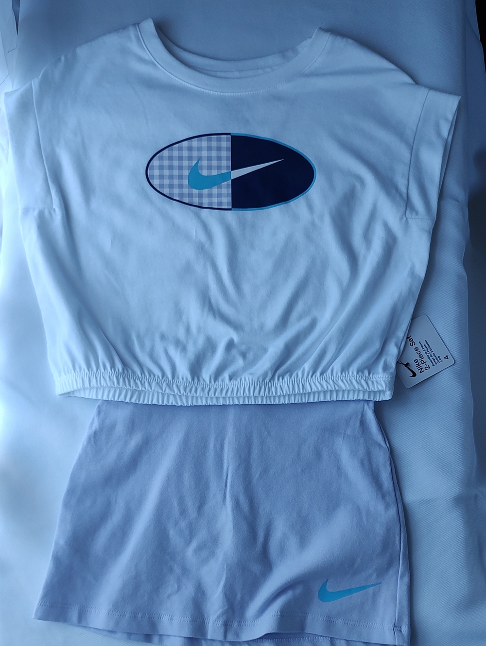 Nike White Crop Top and Skort Set with Teal Swoosh